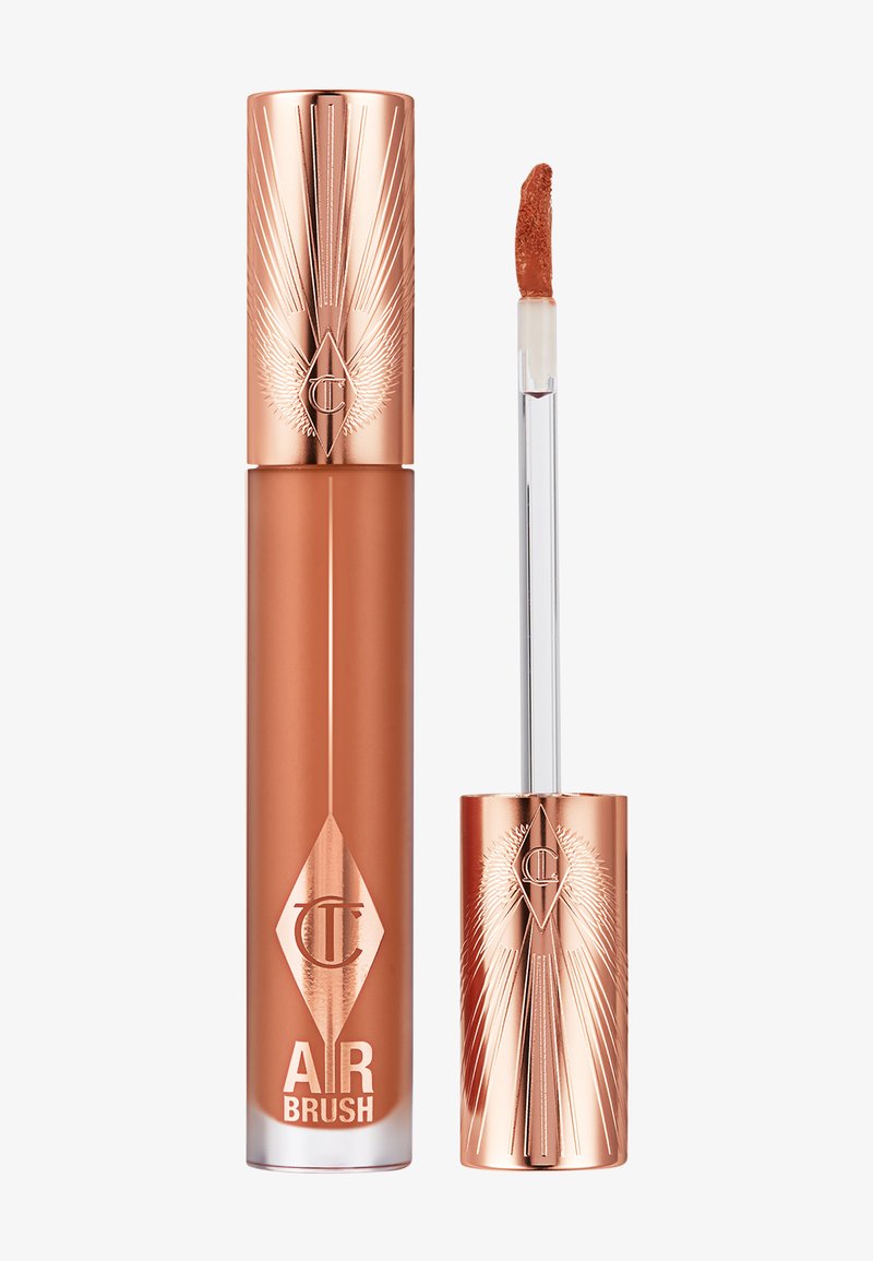 Charlotte Tilbury Airbrush liquid lipstick with rose gold cap and angled doe-foot applicator showing warm brown shade.