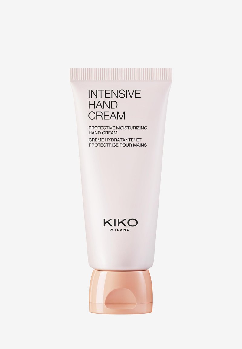Crema Mani Intensiva KIKO Milano in un tubo rosa chiaro con un tappo rotondo pesca. Presenta un testo in bold nero e una finitura liscia e opaca.