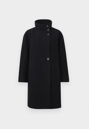 Schwarzer Wollmantel mit hohem Kragen, vorderem Knopfverschluss und zwei aufgesetzten Taschen. Entworfen mit einer geraden Silhouette und langen Ärmeln.