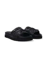 Zwarte leren schuifsandalen met een geknoopt ontwerp op de bovenkant. Platte zool met een gestructureerde, geribbelde rand voor extra grip en comfort.