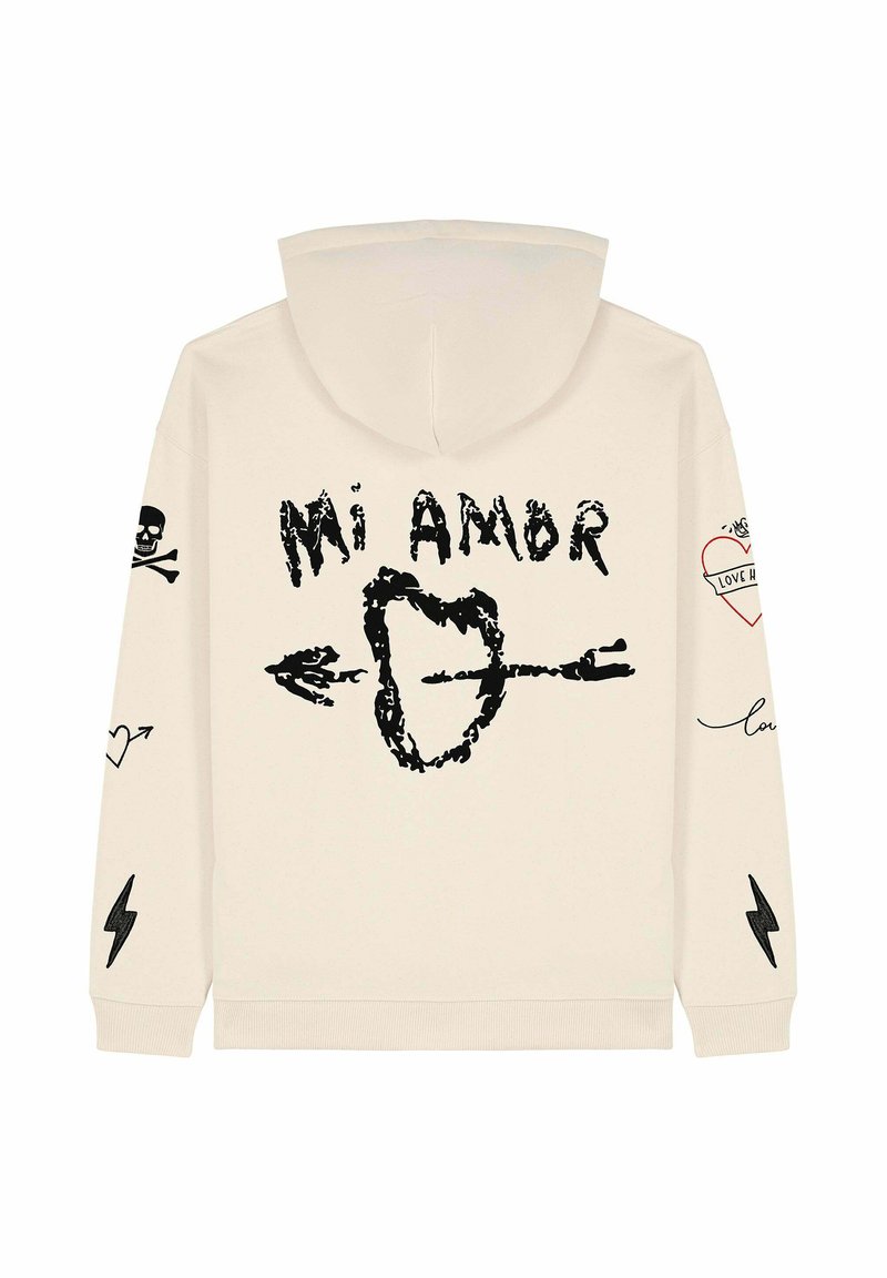Felpa beige con cappuccio caratterizzata da grafiche nere: "Mi Amor", un cuore trafitto da una freccia, teschi, cuori e fulmini. Texture morbida, vestibilità rilassata.