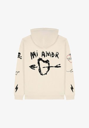 Beige kapuutsiga pusa, millel on mustad graafilised kujundid, sealhulgas "Mi Amor", kolju, südamed ja välgud varrukatel. Pehme kangast tekstuur.