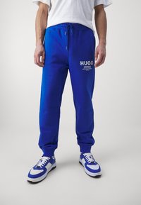 HUGO Träningsbyxor - blue