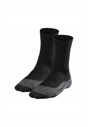 Schwarze Crew-Socken mit gerippten Bündchen und einem grauen Akzent an den Zehen- und Fersenbereichen. Hergestellt aus einem glatten, strapazierfähigen Stoff.