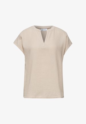 Beige bluse med korte ærmer i tekstureret stof, rund halsudskæring med V-formet notch og løs pasform.