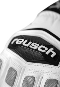 Vitt målvaktshandske med strukturerad grå mesh och en svart gummipatch med "reusch"-logotypen i vitt, omgiven av ett hexagonmönster.