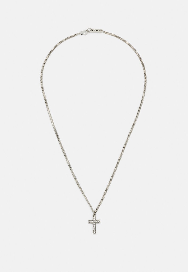 Hõbedane kettkaelakee, millel on väike ristripats, kaunistatud selgete gemmidega, on kujundatud klassikalise kaablilinkide mustriga.