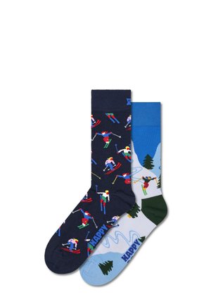 Pair of knee-high socks: one navy with skier pattern, the other light blue with mountain scene and green accents. Cotton blend material.