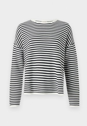 Dlouhý rukáv, top s kulatým výstřihem vyrobený z měkké látky s černobílými vodorovnými pruhy. Obsahuje žebrované manžety a lem.