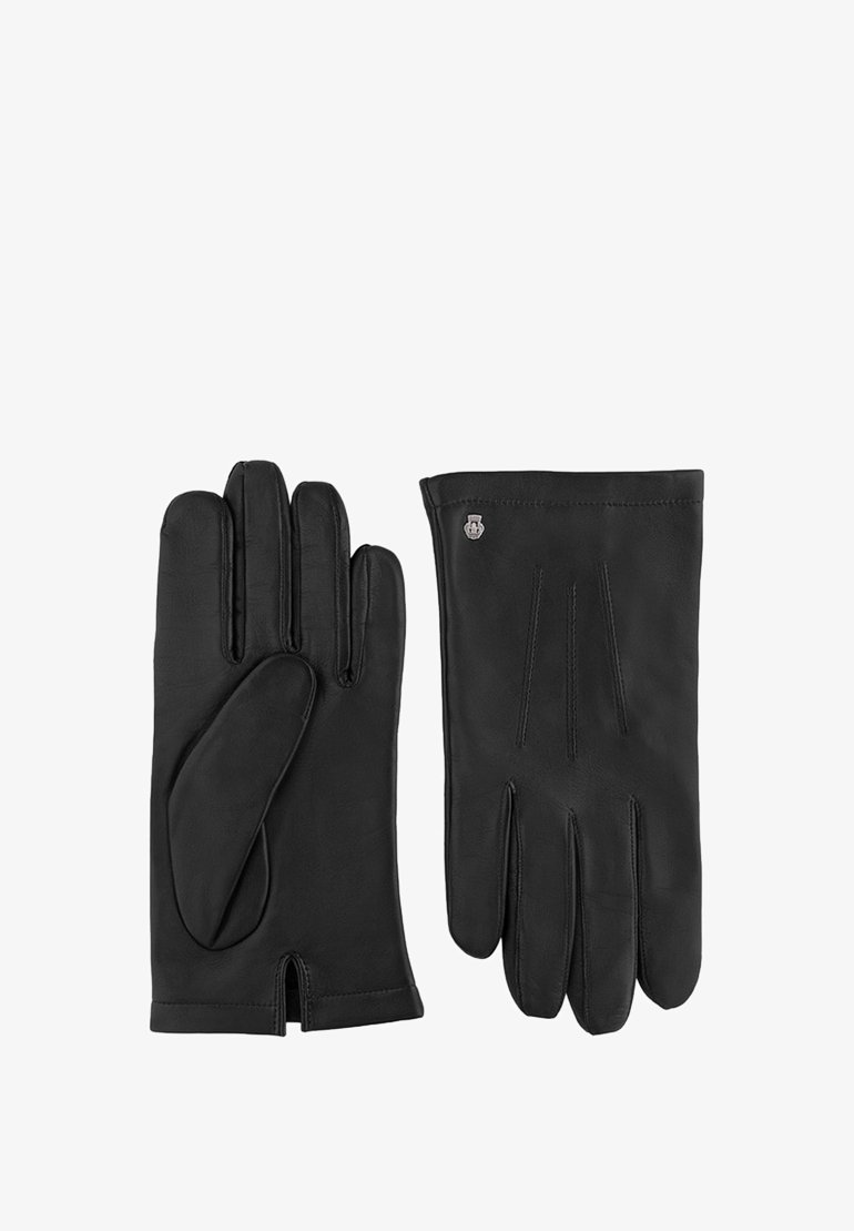 Gants en cuir noir avec une texture lisse, présentant une coupe arrondie au niveau du poignet et des coutures décoratives sur le dos. Petit logo métallique.