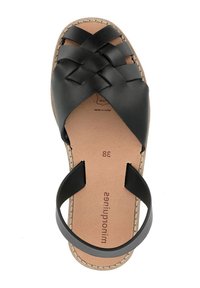 Sandali in pelle nera con un design intrecciato sulla parte superiore, con apertura sul retro, suola piatta e soletta beige. Taglia 38 stampata all'interno.