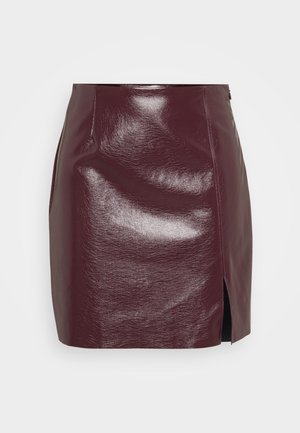 Dark burgundy faux leather mini skirt with a front slit on the left side, smooth texture, and a slight sheen.