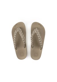 Braided strap flip-flops in soft beige rubber with a matte finish, featuring textured footbed and a flower-shaped logo on the sole.