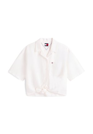 Cămașă albă cu mâneci scurte, nasturi, guler, buzunar la piept, mic logo și nod decorativ în față la tiv.