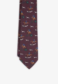 Burgundy tie featuring a repeated pattern of horseback riders and hounds in green and white. Made from smooth fabric with a narrow shape.