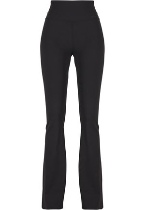 Black flared leggings made of stretchy fabric, featuring a high waistband and smooth texture, designed for comfort and mobility.