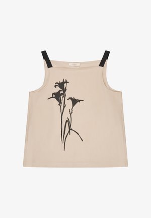 Beige sleeveless top with black straps and a black floral silhouette design on the front center.