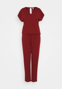 Combinaison sans manches rouge foncé avec col en V, larges manches courtes, haut ample, pantalon à jambes droites et fermeture par bouton à trou au dos.