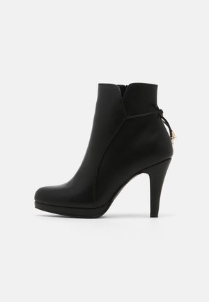 Bottines à talons hauts - black