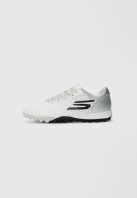 White athletic shoe with a textured silver gradient upper, black accents, and a molded rubber outsole featuring small studs for traction.