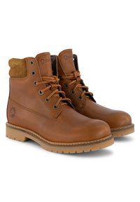 Botas de piel marrón hasta el tobillo con cordones en la parte frontal, con detalles de ante en el cuello, punta redonda y suela de goma con dibujo. Marca en el lateral.