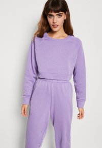 ONLY Tall ONLDEA PALAZZO PANTS - Pantalones - black/negro