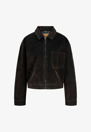 Black corduroy cropped jacket with a front zipper, pointed collar, and a single chest pocket. Soft texture with a clean design.