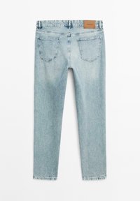 Light blue denim jeans with a high waist, two back pockets, and a tan leather patch on the waistband. Straight leg design, slightly faded.