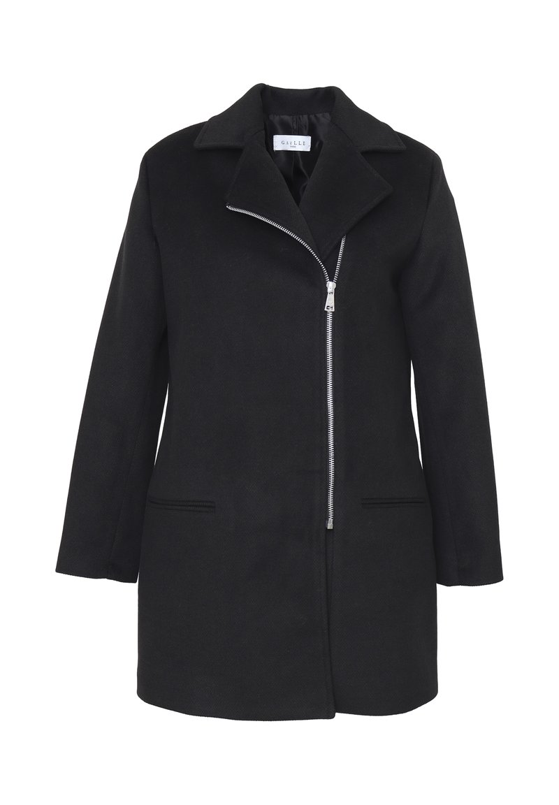 Cappotto in misto lana nero con colletto a punta, chiusura con zip singola, due tasche frontali e una silhouette leggermente oversize. Finitura in tessuto testurizzato.