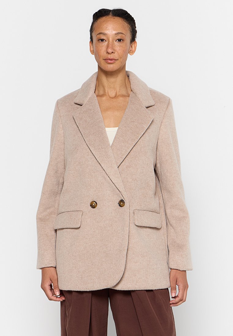 Free People Halflange jas beige Free People Halflange jas beige