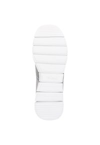 Sohle eines Sneakers mit einem weißen Gummimaterial, strukturiertem Griffmuster und ausgeklügeltem Design mit markanten horizontalen Rillen.