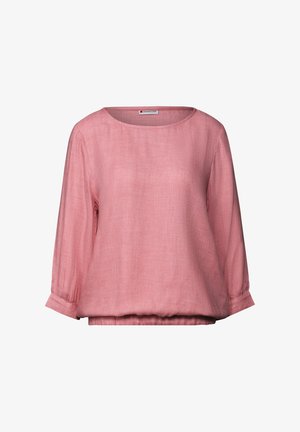 Chemisier en lin rose clair avec un col rond, des manches trois-quarts et une taille élastique. Présente un tissu lisse et texturé.