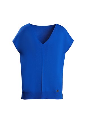 Top bleu à encolure en V avec des manches courtes, fabriqué en tissu lisse. Présente une couture verticale subtile et un emblème décoratif à l'ourlet.