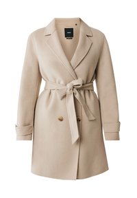Abrigo de mezcla de lana beige con diseño de doble botonadura, cintura ceñida con cinturón, solapas dentadas y dos botones decorativos en la parte frontal.