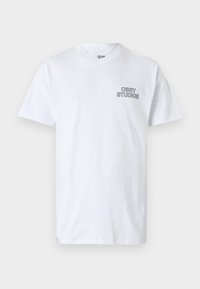 White cotton t-shirt featuring a round neckline and short sleeves, with "OBEY STUDIOS" printed in black on the left chest area.