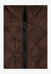 Geselecteerd, coffee brown