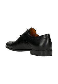 Scarpa oxford in pelle nera con finitura liscia, punta arrotondata, design allacciato e tacco basso impilato. L'interno presenta una fodera a contrasto in tonalità marrone chiaro.