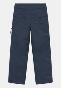 Marineblaue, wasserdichte Hosen mit lockerer Passform, die zwei Gesäßtaschen, eine Seitentasche mit grünem Reißverschluss und verstärkte Säume aufweisen.