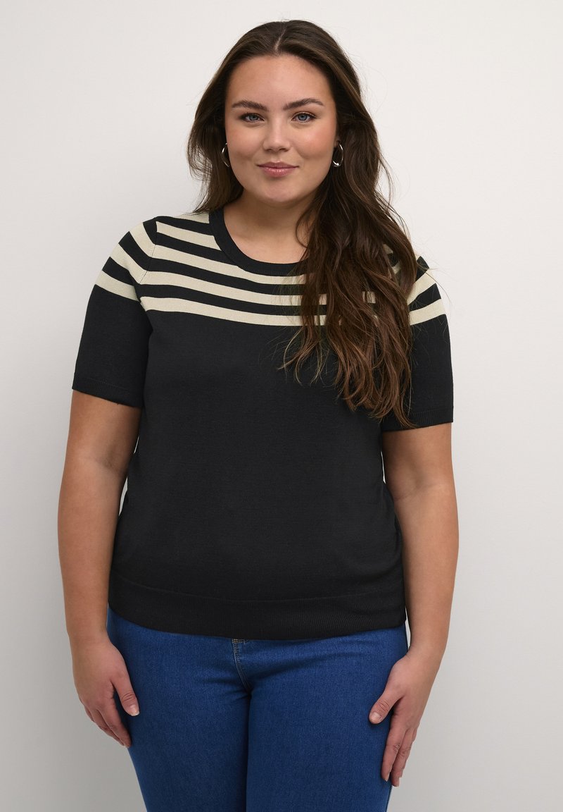 Black short-sleeve sweater with cream horizontal stripes on the upper body, crafted from a soft material, featuring a round neckline and fitted hem.