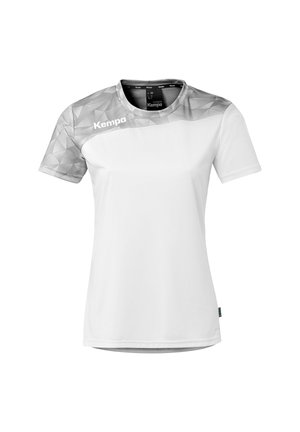 T-shirt de sport pour femmes blanches avec motif géométrique gris sur les épaules et les manches, col rond, et logo "Kempa" sur la poitrine.
