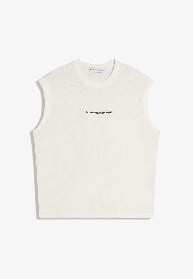 Haut sans manches en maille blanche avec encolure ronde et petit texte noir "lowsignal" centré sur la poitrine.