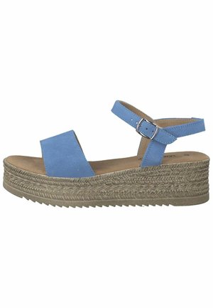 Blue suede wedge sandals with an ankle strap, featuring a cork-like textured sole and a wide front band for support.