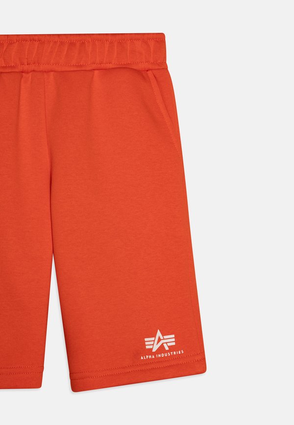 BASIC UNISEX - Tracksuit bottoms - boost orange2