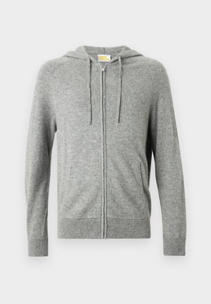 Šedá mikina na zip s kapucí se šňůrkou, žebrovanými manžetami a hladkou texturou. Má boční kapsy a čistý přední design.