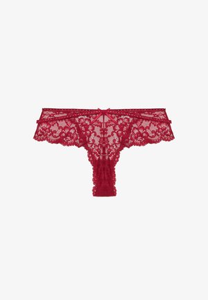 Rote Spitzenstring mit Blumenmuster, gewellten Kanten und einer Schleifendetail vorne. Zartes, durchsichtiges Material mit einer weichen Textur.