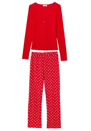 Haut rouge à manches longues côtelé avec trois boutons et pantalon de pyjama assorti rouge à motif floral blanc. Matière douce et confortable.