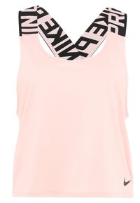 Haut de sport sans manches rose clair avec des larges bretelles croisées noires et roses, featuring un texte en gras et un petit logo noir Nike sur le bas avant.