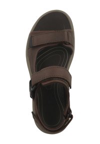 Ruskeat nahkasaappaat, joissa on kaksi säädettävää hihnaa, teksturoitu pohja ja muotoiltu sisäpohja, jossa on kestävä vaalea ulkopohja.