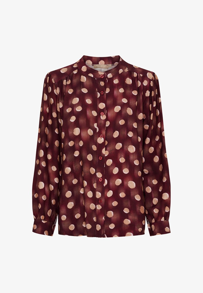 Langærmet bordeaux bluse med høj hals, prydet med et mønster af cremede prikker og frontknapper. Silkeagtig tekstur, løs pasform.