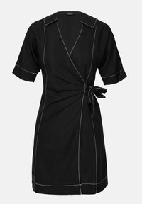 Black wrap dress made of smooth fabric, featuring short sleeves, a tie at the waist, and white contrasting stitching along the seams.